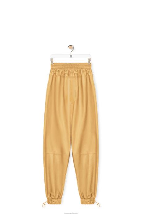 Loewe mujer pantalones elásticos en napa efecto papel LP641115 arena/mantequilla